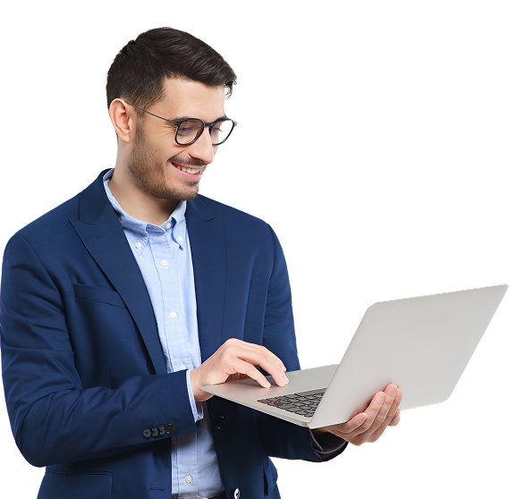Businessman reviewing work on a laptop